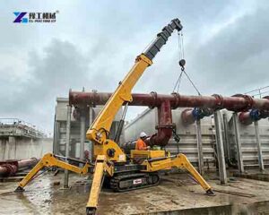 spider crane for pipe installation at sewage treatment plant